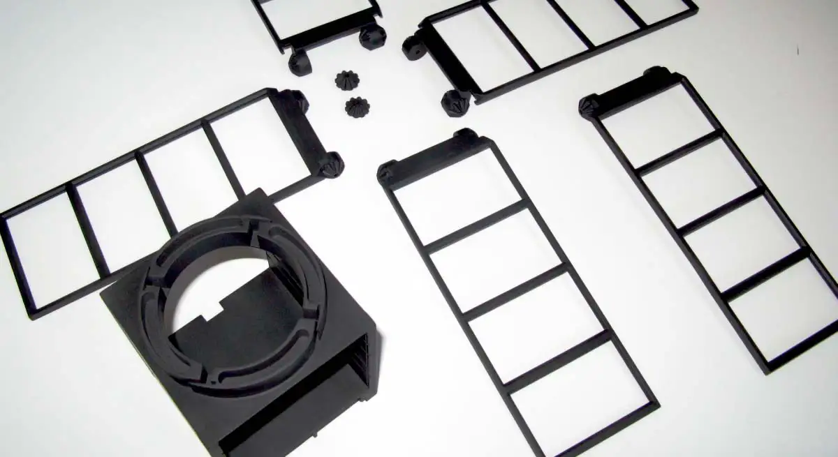 Construction of the entire structure of a functional 2U CubeSat with propulsion subsystem using PBF 3D printing process and carbon fiber reinforced composite
