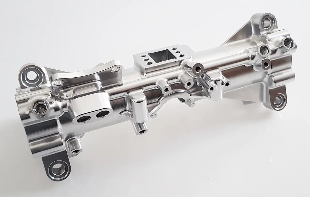 CNC machined power steering rack housing, aluminum 2014